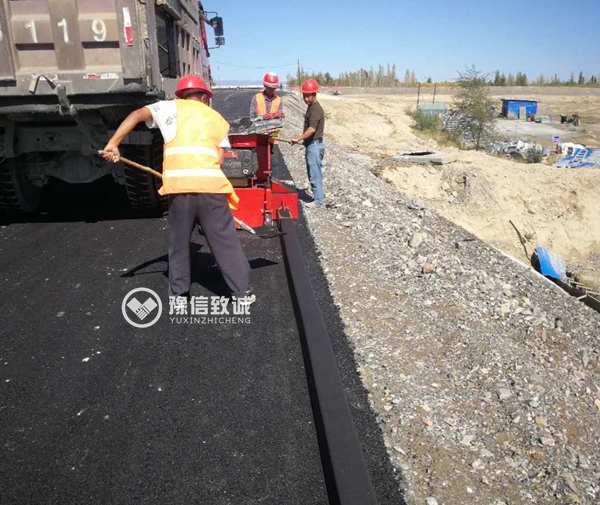 瀝青砂攔水帶機,小型攔水帶滑模機